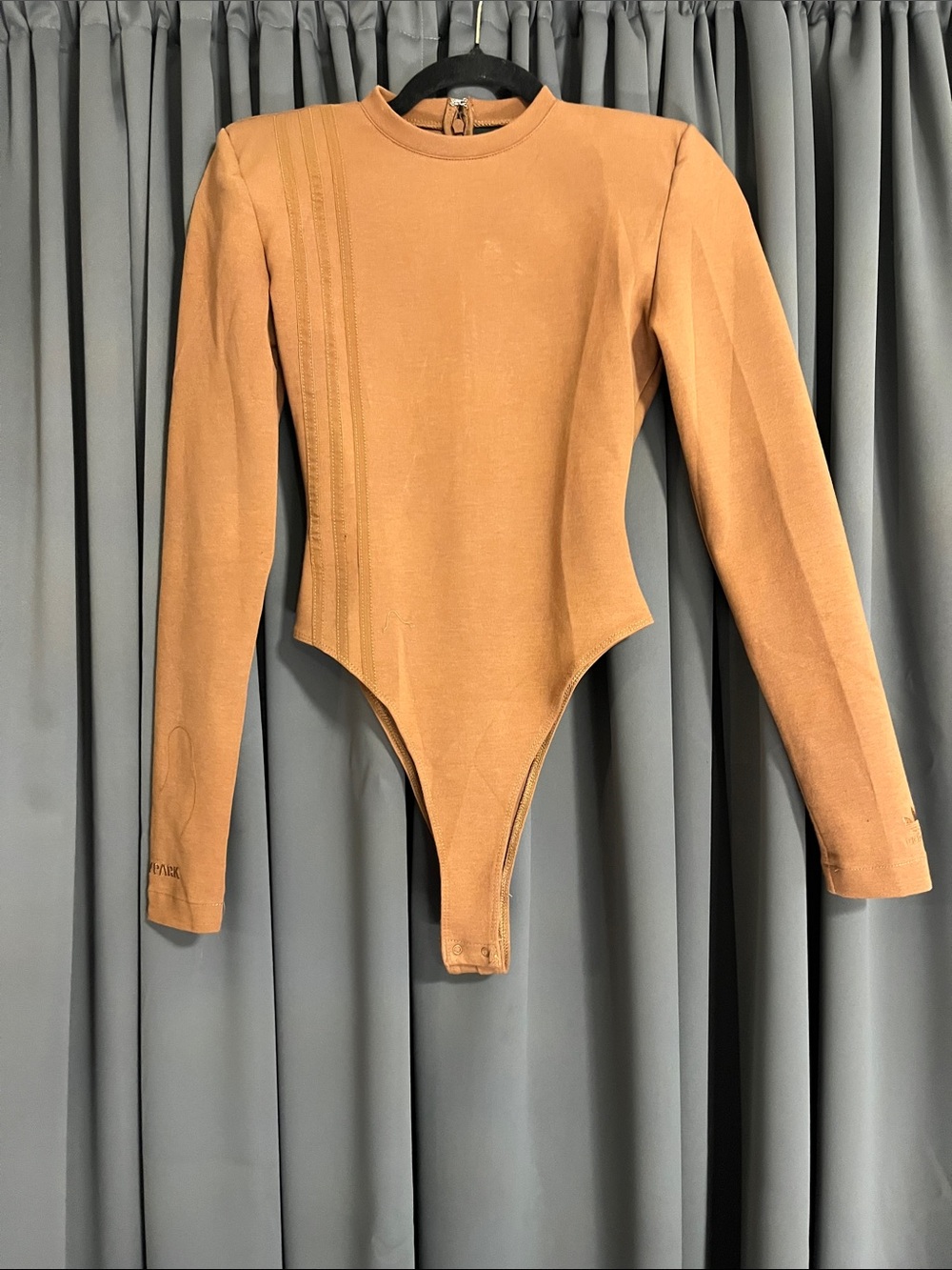 IVY PARK Tan Long Sleeve One-Piece Bodysuit